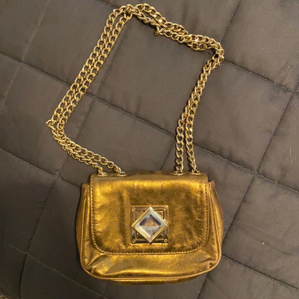 Michael Kors gold clutch